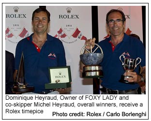 Dominique Heyraud, Owner of FOXY LADY and co-skipper Michel Heyraud, overall winners, receive a Rolex timepice 
, Photo credit: Rolex / Carlo Borlenghi